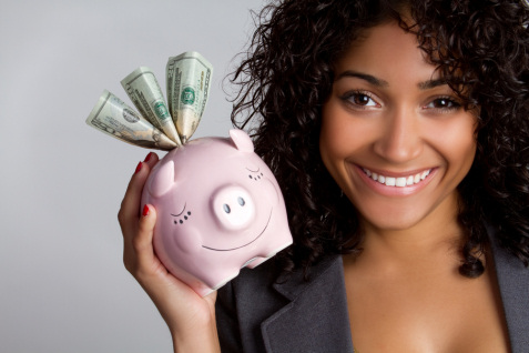 Tecademics black-woman-save-money-holding-piggy-bank